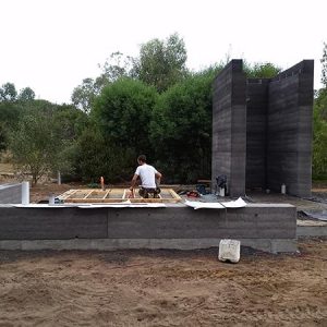 Rammed earth walls take shape at this Balnarring project