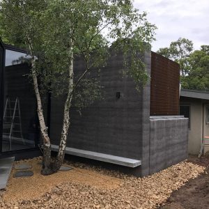 Olnee rammed earth houses, walls and construction