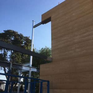 Olnee rammed earth houses, walls and construction